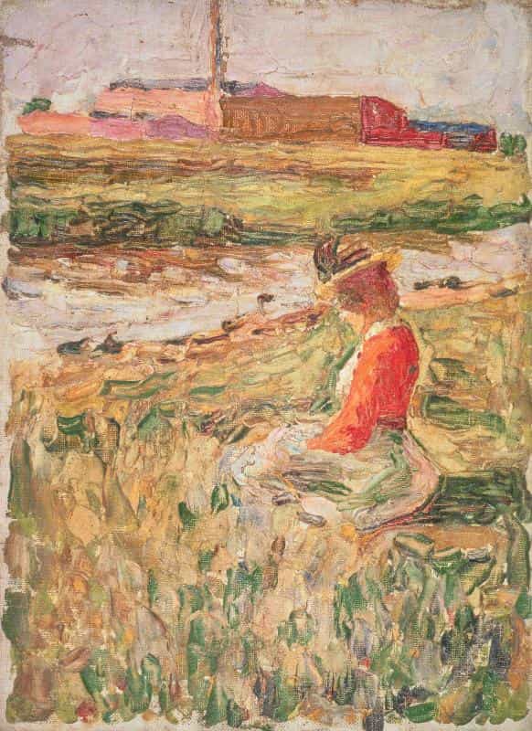 草原に座る夫人